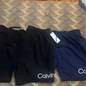 Calvin Klein Men’s Swim Trunks — Black & Navy Blue